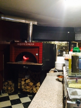 Wood pizza oven D140C, brick style, 150 pizzas á Ø 30 cm per hour, fixed & unheated baking surface, weight 1.700 kg